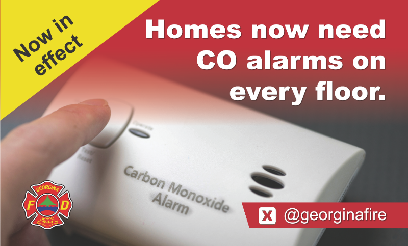 Now in effect Homes now need CO alarms of every floor with an image of a carbon monoxide alarm with a finger pressing a button and the Georgina Fire and Rescue Services Logo