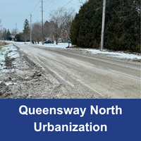 dirt road with trees in the background